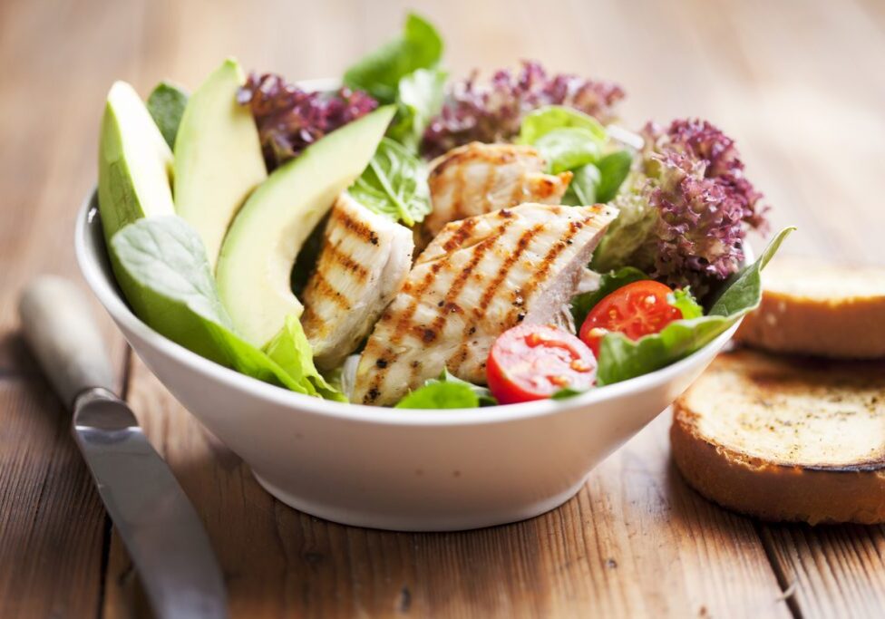 salad with avocado and grilled chicken fillet